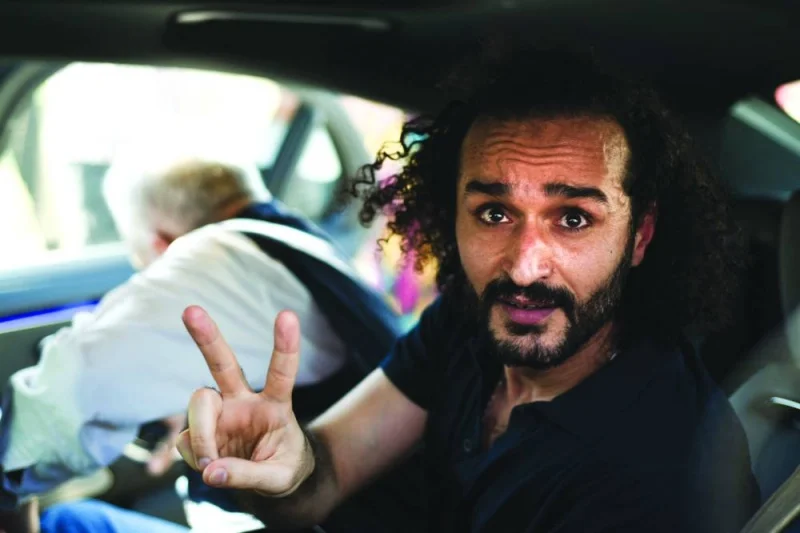 
Egyptian activist Ahmed Douma, a leading figure in the country’s 2011 uprising who has spent the last decade behind bars, gestures following his release from prison yesterday. 