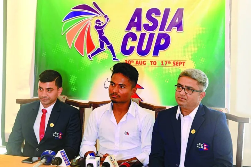 Nepal’s cricket team manager Pradeep Majgaiyan (left), captain Rohit Paudel (centre) and coach Monty Desai attend a press conference 
before leaving for the Asia Cup, in Kathmandu, on Tuesday. (AFP)