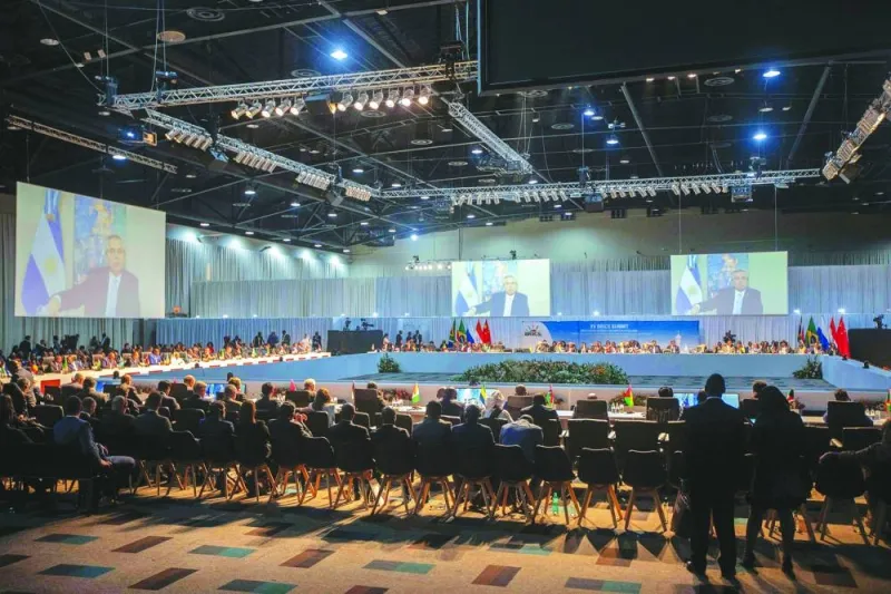 
A screen shows the President of Argentina delivering remarks at a meeting during the 2023 Brics Summit at the Sandton Convention Centre in Johannesburg. 