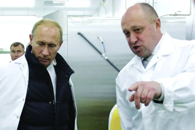 
This picture taken in 2010 shows Prigozhin with then-prime minister Putin at an event outside Saint Petersburg. 