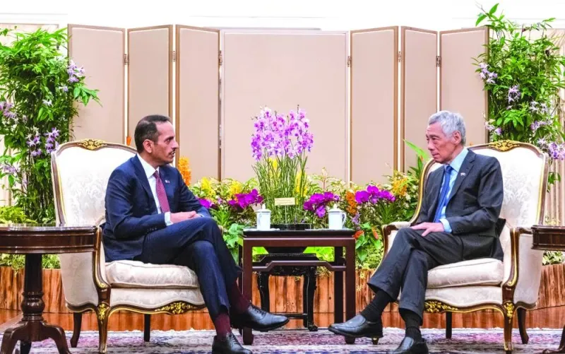 HE the Prime Minister and Minister of Foreign Affairs Sheikh Mohamed bin Abdulrahman bin Jassim al-Thani holding talks with Prime Minister of Singapore Lee Hsien Loong at The Istana presidential palace in Singapore, yesterday.