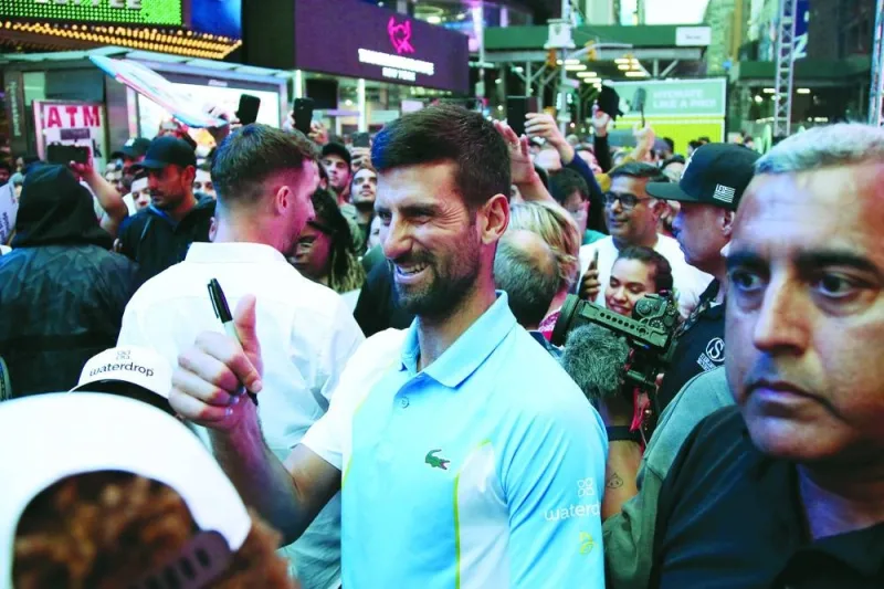 
Serbian tennis player Novak Djokovic meets with fans after playing at a pop-up tennis court during a US Open event at Times Square in New York. The 2023 US Open begins on August 28. (AFP) 