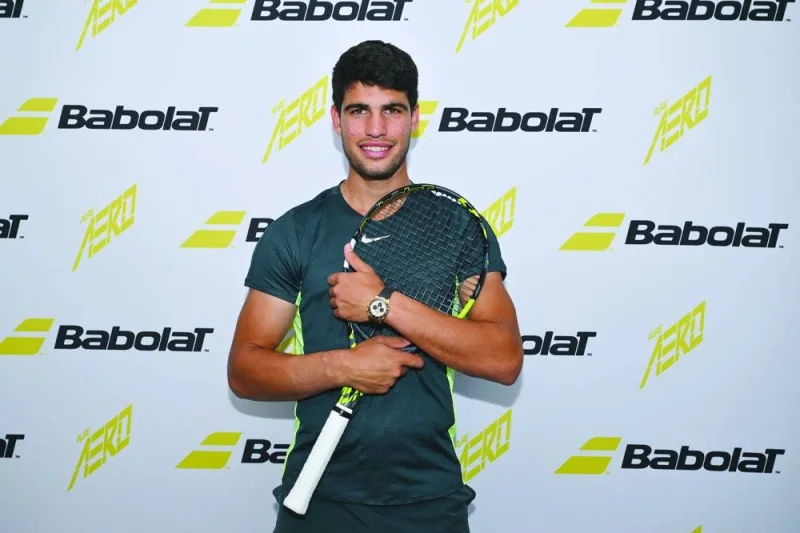 
Spanish player Carlos Alcaraz, the world No.1, attends a Babolat event where he announced the renewal of his contract with the racquet 
company ahead of the US Open in New York. (AFP) 