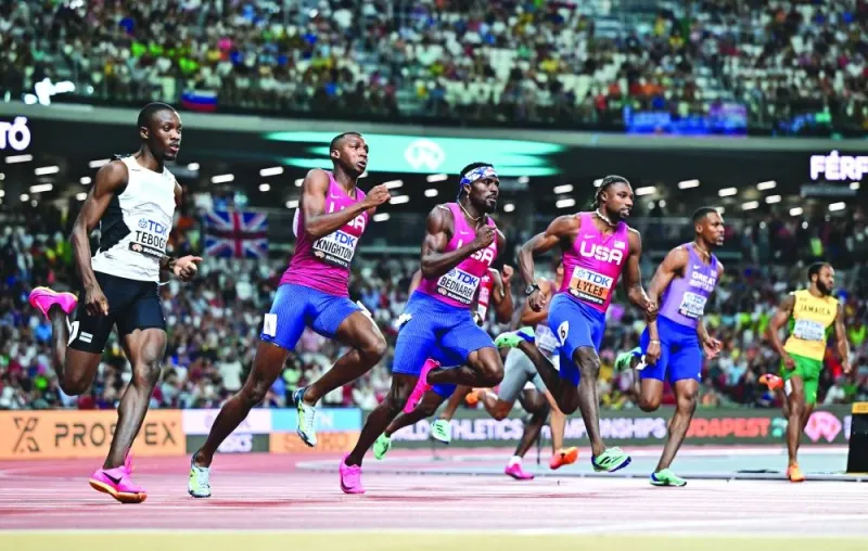 American Noah Lyles (third right) sprints ahead of the pack to win the 200m final at the World Athletics Championship in Budapest on Friday. (Reuters)
