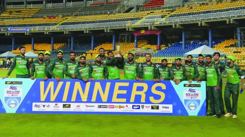 Pakistan players pose with the ODI trophy after beating Afghanistan in the third and final match at R. Premadasa Stadium in Colombo on Saturday.(AFP)