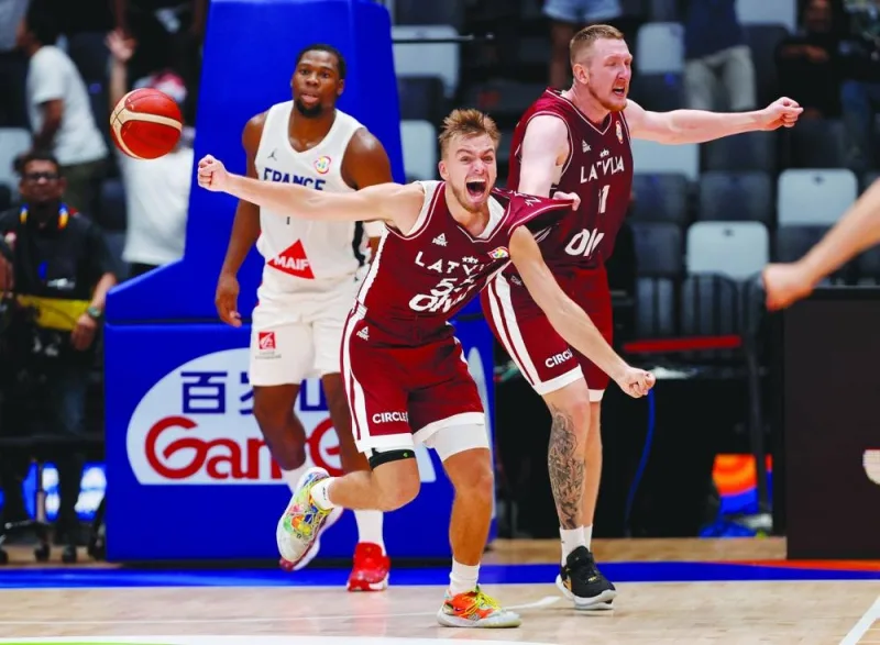 Latvia’s Arturs Zagars celebrates after his team beat France 88-86 in their FIBA World Cup 2023 First Round Group H clash at Indonesia Arena, Jakarta, on Sunday. (AFP)
