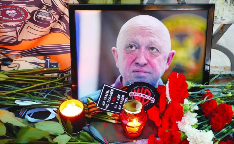 
A view shows a portrait of Wagner mercenary chief Yevgeny Prigozhin at a makeshift memorial in Moscow on Thursday. (Reuters) 