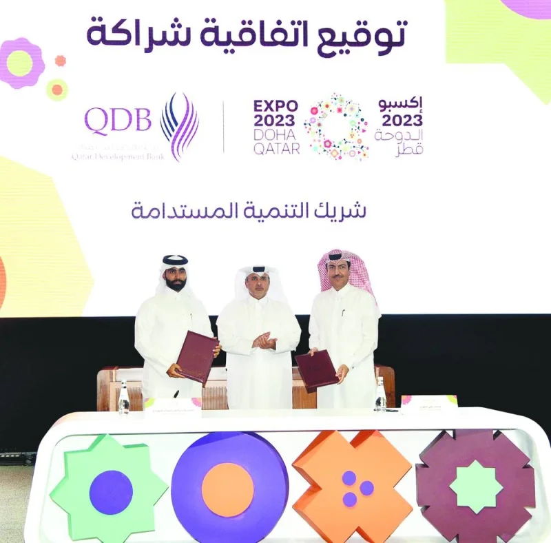 HE the Minister of Municipality Dr Abdullah bin Abdulaziz bin Turki al-Subaie is flanked by QDB CEO Abdulrahman Hesham al-Sowaidi and Expo 2023 Doha secretary general Mohamed Ali al-Khory at the agreement signing.