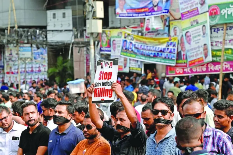 BNP activists form a human chain to mark the International Day of the Victims of Enforced Disappearances, along a street in Dhaka on Wednesday.