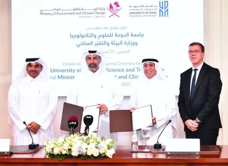 HE the Minister of Environment and Climate Change Sheikh Dr Faleh bin Nasser bin Ahmed bin Ali al-Thani and UDST president Dr Salem Al-Naemi are flanked by Dr Ibrahim al-Maslamani and Dr Rachid Benlamri at the agreement signing ceremony on Thursday. PICTURE: Thajudheen.