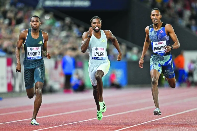 
Noah Lyles (centre) of the US storms to 200m victory in Zurich. (AFP) 
