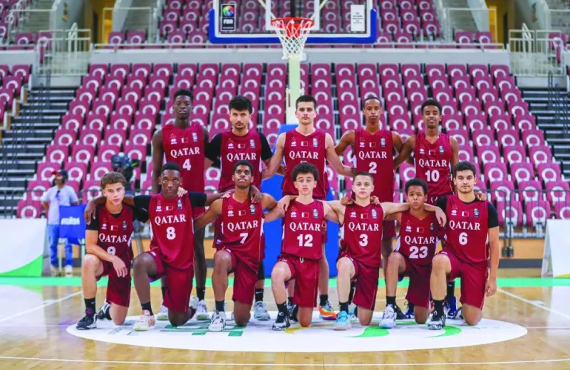 
Qatar’s U16 basketball players pose for a group photo. 