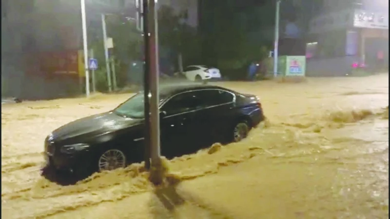 
A view shows flooding on the street, following heavy rainfall in Yongtai, Fujian Province, China, in this screen grab from a video released yesterday. 