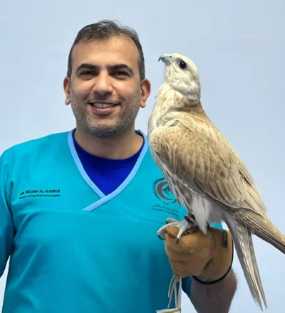 Dr Ikdam Majed AlKarkhi with a falcon (supplied picture).