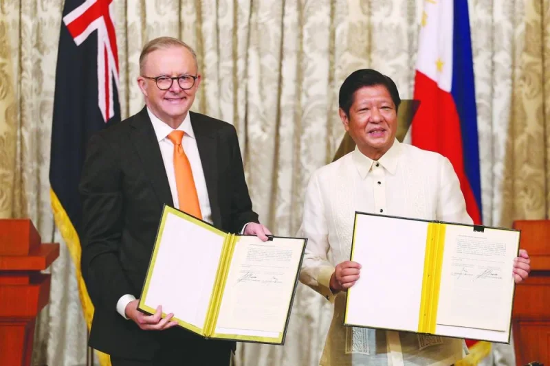 Australia’s Prime Minister Anthony Albanese and Philippine President Ferdinand Marcos Jr pose for a photo after signing a memorandum of understanding during the former’s visit to the Malacanang Presidential Palace in Manila, Philippines, on Friday. The Philippines and Australia shored up their security and economic alliance with the signing of the strategic partnership, as they seek to counter China’s growing regional influence.