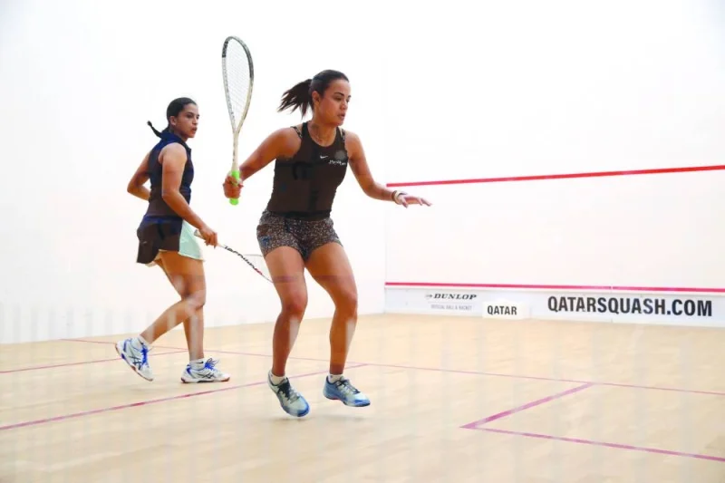 Egyptian Nour Aboulmakarim and Menna Hamed in action during the first round match of the QTerminals Qatar Classic in Doha on Saturday.