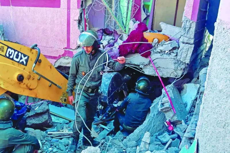 
Rescue workers search for survivors in a collapsed house in Moulay Brahim, Al Haouz province, yesterday. 