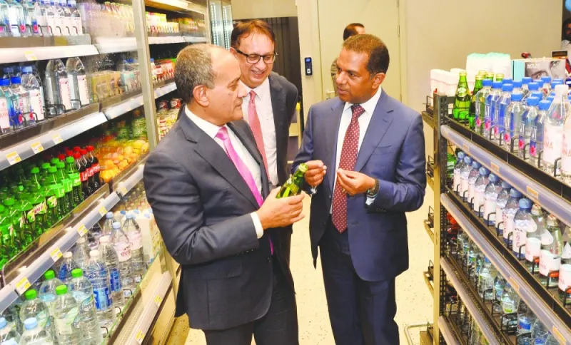 Commercial Bank Group CEO Joseph Abraham, LuLu Group International Director Dr Mohamed Althaf and Commercial Bank executive general manager and head (Retail Banking) Shahnawaz Rashid at Qatar’s first and the region’s second cashier less check-out free store: LuLu Express at Hamad International Airport Metro Station.  
PICTURE: Shaji Kayamkulam