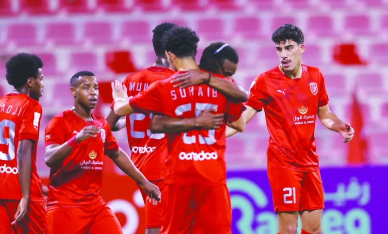 Al Duhail players celebrate their opening goal against Al Shamal scored by Fares Said Amer (right) in their opening Group B match of Ooredoo Cup 2023-24 at the Grand Hamad Stadium on Sunday.