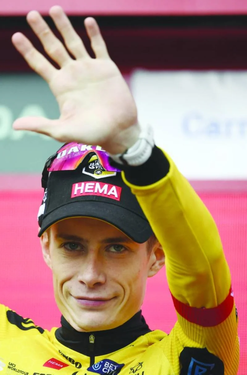 Team Jumbo-Visma’s Danish rider Jonas Vingegaard celebrates on the podium winning the stage 16 of the 2023 La Vuelta cycling in Bejes on Tuesday. (AFP)