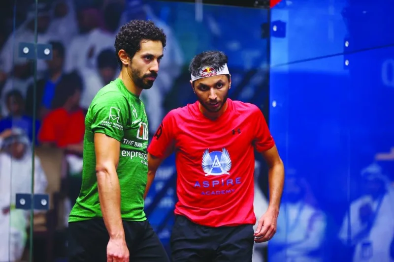 Qatar’s Mohamed Abdullah al-Tamimi (right) congratulates eighth seed Tarek Momen of Egypt after their third-round clash on Tuesday.