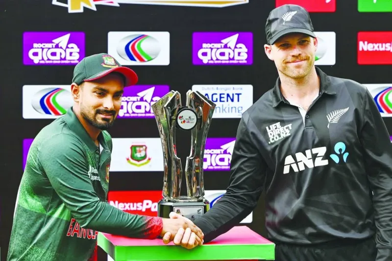 
Bangladesh’s captain Litton Das (left) and New Zealand’s captain Lockie Ferguson shake hands after unveiling the series trophy at the Sher-e-Bangla National Cricket Stadium in Dhaka on the eve of their first one-day international. (AFP) 