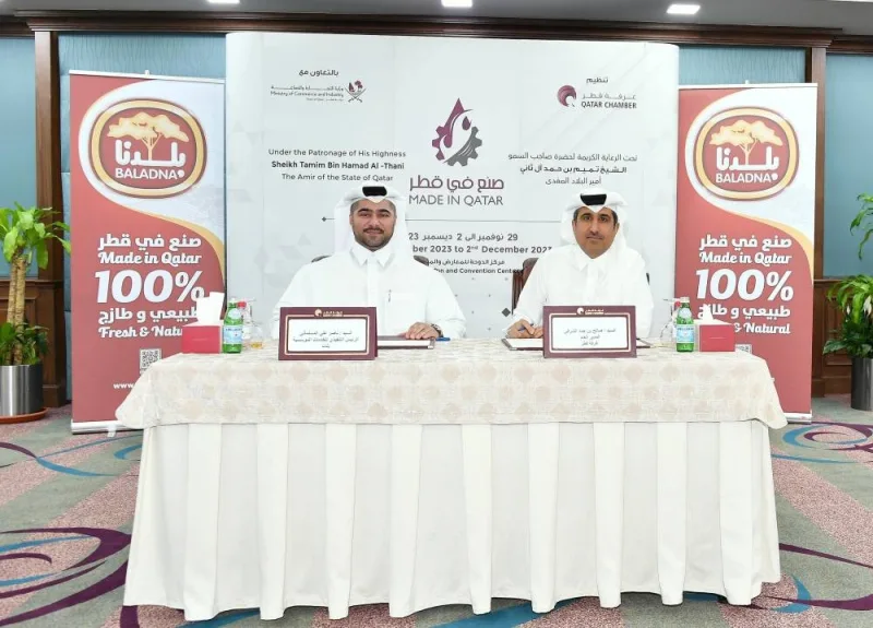 Saleh bin Hamad al-Sharqi, general manager of Qatar Chamber and chairperson of the exhibition’s Technical Committee, and Nasser Ali al-Maslamani, chief corporate services officer of Baladna, during the signing ceremony held at the chamber’s headquarters.