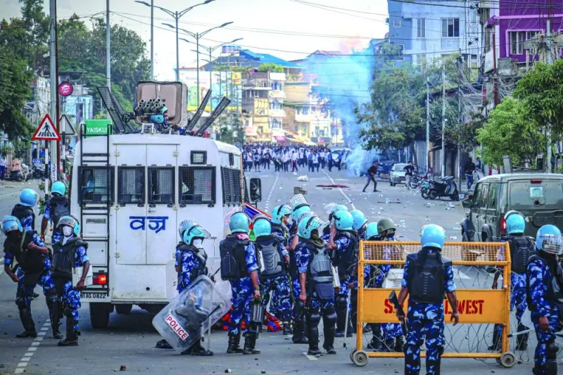 
Security personnel fire tear gas as students protest against the killing of two missing students by unknown miscreants and to demand peace in India’s northeastern state of Manipur amid ongoing ethnic violence, in Imphal, yesterday. 