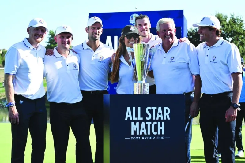 Serbian tennis star Novak Djokovic, Former Welsh footballer Gareth Bale and former European Ryder Cup captain Colin Montgomerie pose with the trophy on the 18th green after the All-Star match in Rome on Thursday. (AFP)