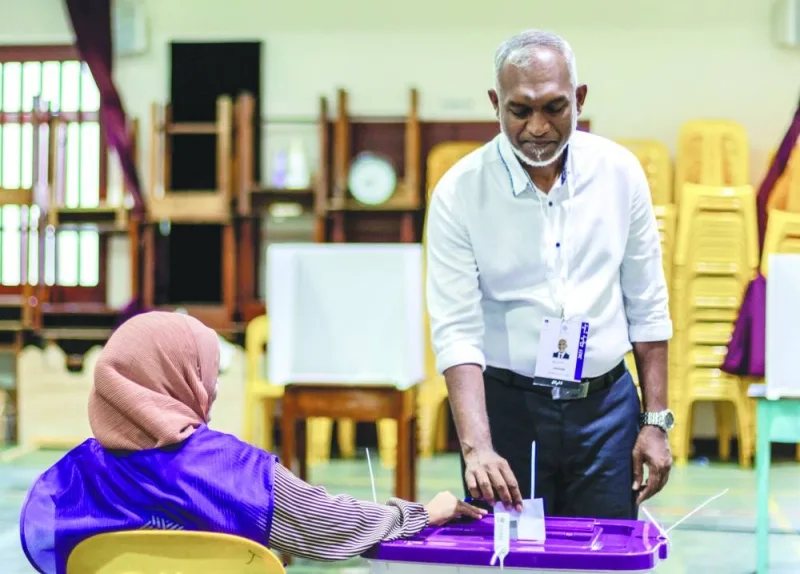 
Mohamed Muizzu, Maldives presidential candidate of the opposition party, People’s National Congress, casts his vote during the second round of a presidential election in Male yesterday. (Reuters) 