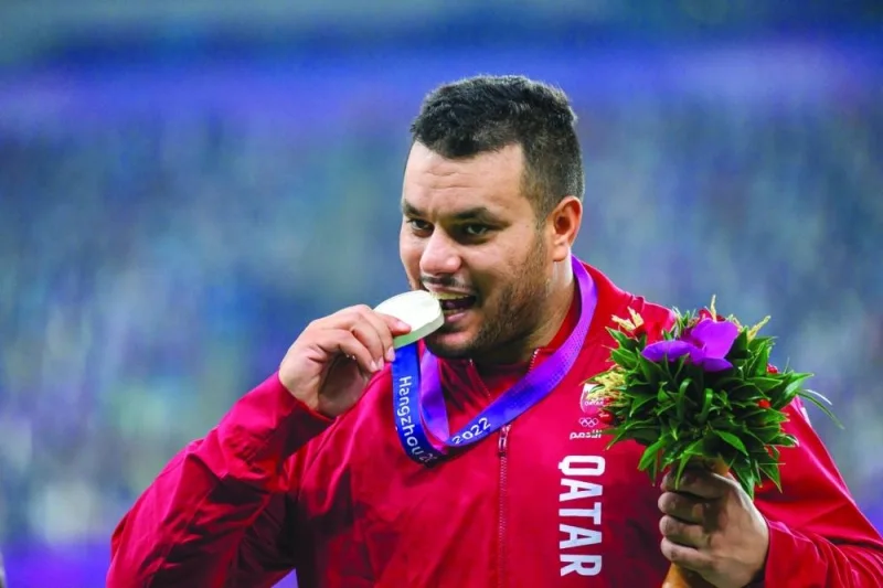 Ashraf Elseify celebrates with his Silver Medal In Hangzhou
