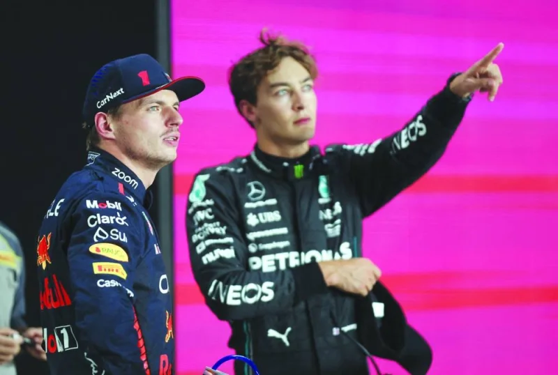 Pole-sitter Max Verstappen (left) of Red Bull with Mercedes&#039; George Russell, who finished second in the qualifying, during the Formula One Qatar Grand Prix at the Lusail International Circuit on Friday.
