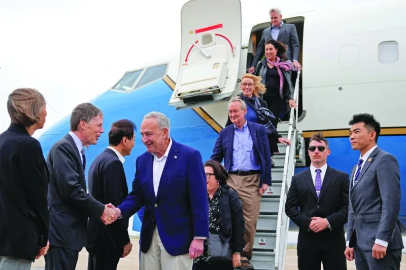 
US Senate Majority Leader Chuck Schumer and other members of the delegation arrive at Shanghai Pudong International Airport in Shanghai, China. 