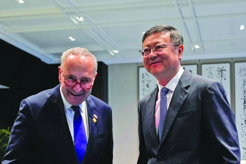
US Senate Majority Leader Chuck Schumer poses with Shanghai Party Secretary Chen Jining, in Shanghai. 