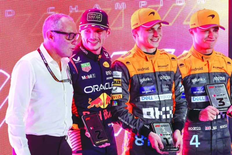 (From L-R) Formula One CEO Stefano Domenicali, Red Bull Racing’s Dutch driver Max Verstappen, McLaren’s Australian driver Oscar Piastri, and McLaren’s British driver Lando Norris pose for a picture after the sprint race on Saturday, ahead of the Qatar Formula One Grand Prix at the Lusail International Circuit. (AFP)