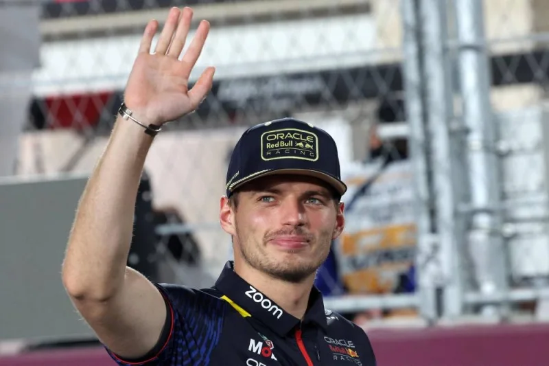 Red Bull Racing&#039;s Dutch driver Max Verstappen greets the fans ahead of the Qatari Formula One Grand Prix at Lusail International Circuit. Giuseppe CACACE / AFP