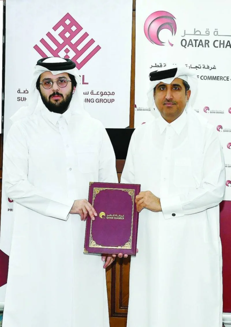 Saleh bin Hamad al-Sharqi, general manager of Qatar Chamber and chairperson of the exhibition’s Technical Committee, and Sheikh Khalifa bin Abdulaziz bin Mubarak al-Thani, executive vice-president of the Services Sector in Suhail Industrial Holding Group, during the signing ceremony held at the chamber&#039;s Doha headquarters.