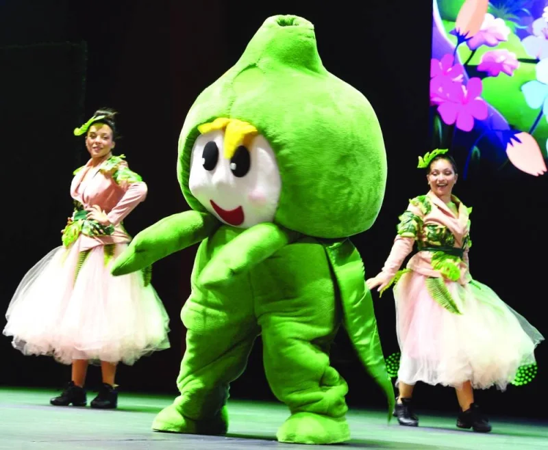 A cartoon character on stage along with other performers at Expo 2023 Doha Tuesday.