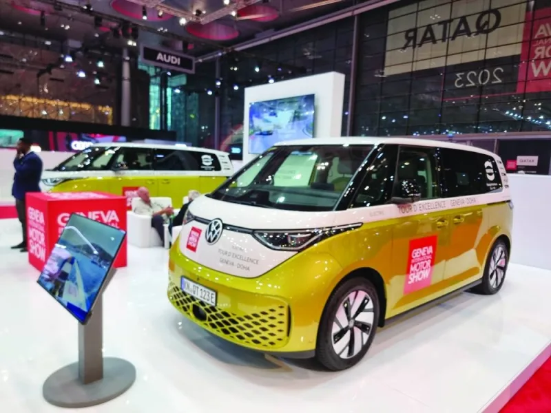 Two electric Volkswagen ID Buzz cars used for the 34-day Tour d&#039;Excellence expedition showcased at the exhibition.