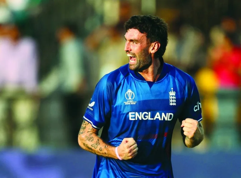 England’s Reece Topley celebrates taking the wicket of Bangladesh’s Mushfiqur Rahim on Tuesday. (Reuters)
