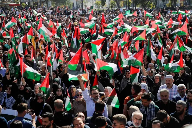 People attend a demonstration to express solidarity with Palestinians in Gaza, amid the ongoing conflict between Israel and the Palestinian Islamist group Hamas, at Beyazit Square in Istanbul, Turkey Friday. REUTERS