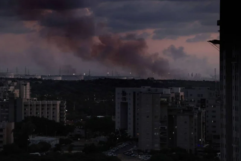 Picture taken from the Israeli city of Ashkelon shows smoke rising from the Gaza Strip Friday.  AFP
