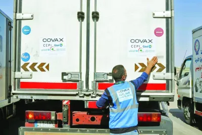 
(File photo) A man checks a vehicle containing a shipment of the AstraZeneca vaccine against the Covid-19 at Baghdad International Airport, in Baghdad, Iraq. (Reuters) 