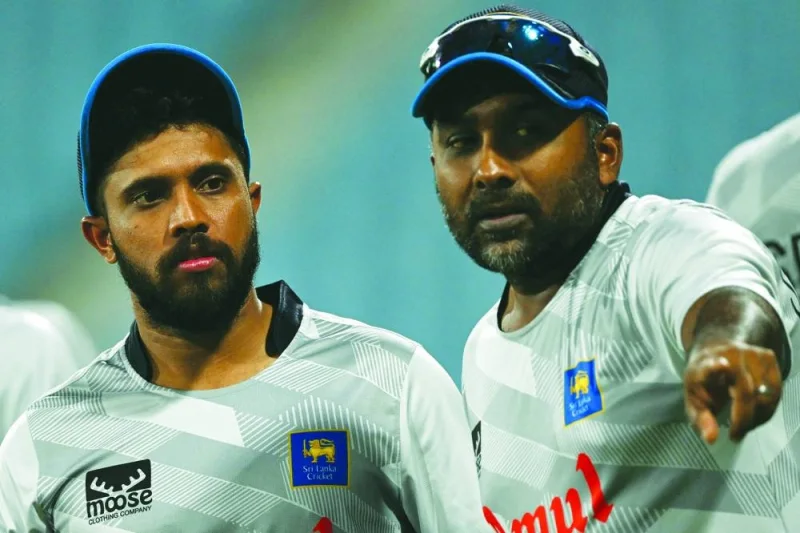 Sri Lanka&#039;s Kusal Mendis (left) listens to his team consultant Mahela Jayawardene during a practice session on the eve of their 2023 ICC Cricket World Cup match against Australia in Lucknow yesterday. (AFP) 