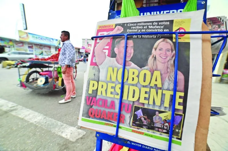 
A newspaper cover is pictured in Santa Elena, Ecuador, the day after Ecuador’s presidential candidate for the National Democratic Action Party, Daniel Noboa, won the runoff election. 