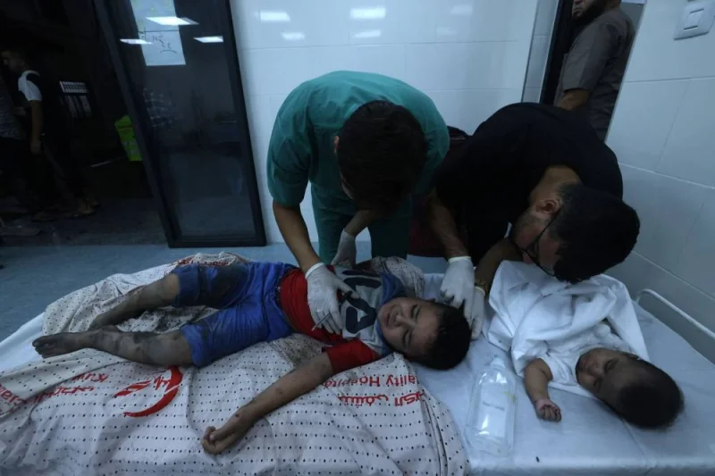Wounded Palestinian children receive treatment at a hospital in the Rafah refugee camp, in the southern Gaza Strip on Tuesday. AFP