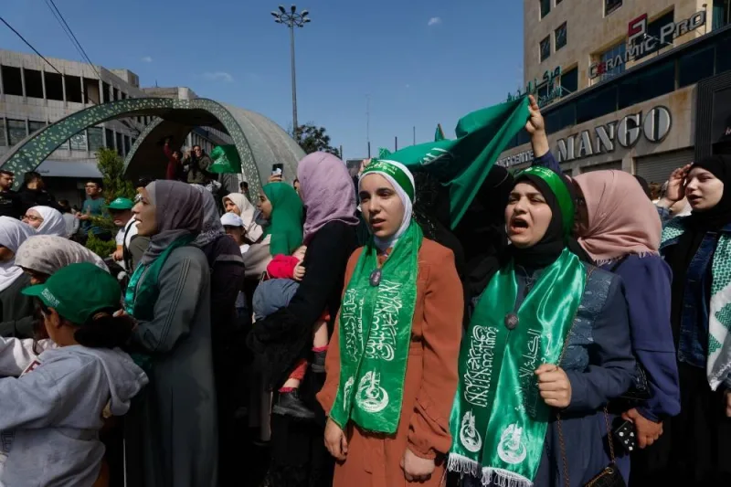 Hamas supporters demonstrate after hundreds of Palestinians were killed in a blast at Al-Ahli hospital in Gaza that Israeli and Palestinian officials blamed on each other, in Hebron in the Israeli-occupied West Bank Wednesday. REUTERS