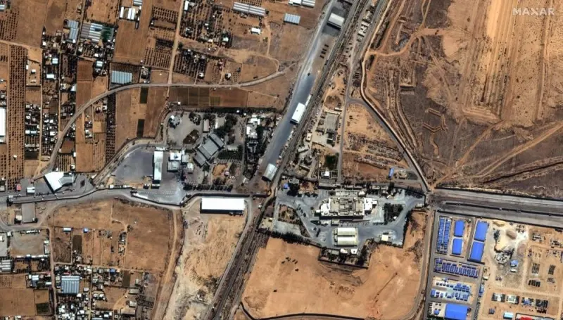 This handout satellite picture courtesy of Maxar Technologies taken on October 15, Sunday, shows Rafah border crossing to Egypt. AAFP/ Satellite image ©2023 Maxar Technologies