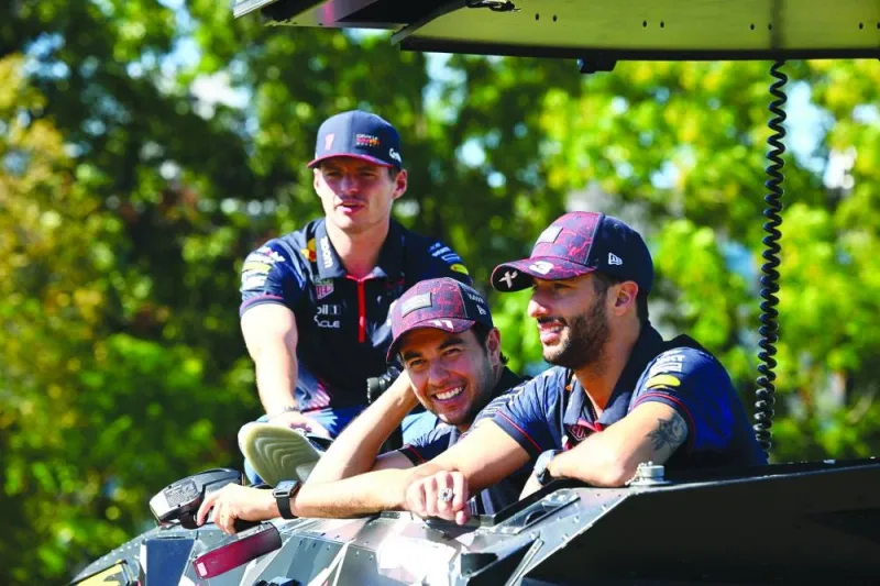 
Max Verstappen, Checo Perez and Daniel Ricciardo of Oracle Red Bull Racing Team participating in a marketing event in Austin, Texas. (AFP) 