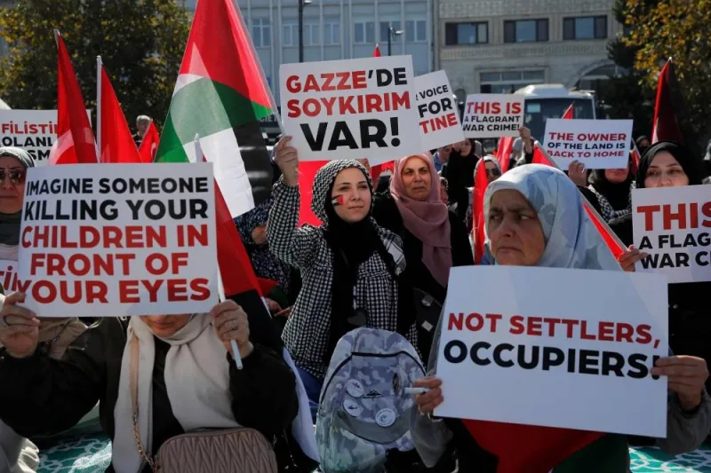Pro-Palestinian demonstrators take part in a sit-in protest as the conflict between Israel and Hamas continues, in Istanbul, TurkeyFriday. REUTERS